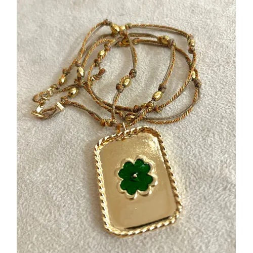 Médaille trèfle